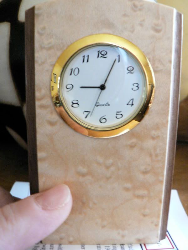 clock with thumb