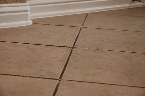 How long after grouting a floor do I have to wait before mopping?