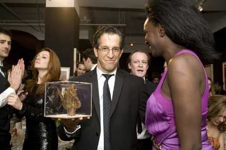 Kenneth Cole holding my work