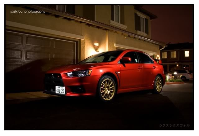 IMAGE: http://i13.photobucket.com/albums/a268/evomacky/EvoXFire02.jpg