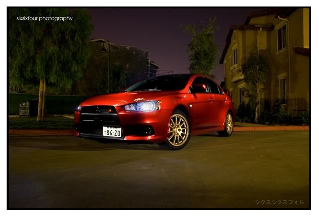 IMAGE: http://i13.photobucket.com/albums/a268/evomacky/EvoXQTR01.jpg