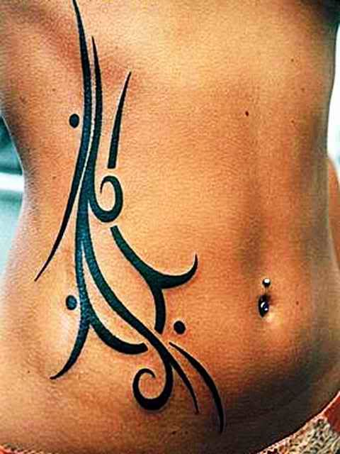 girl piercing tattoo