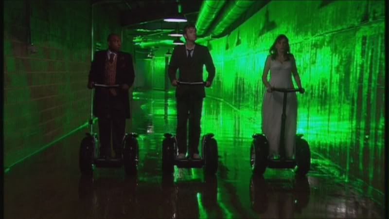 The Doctor, Lance and Donna travel along the basement corridor of the H.C. Clements building in The Runaway Bride