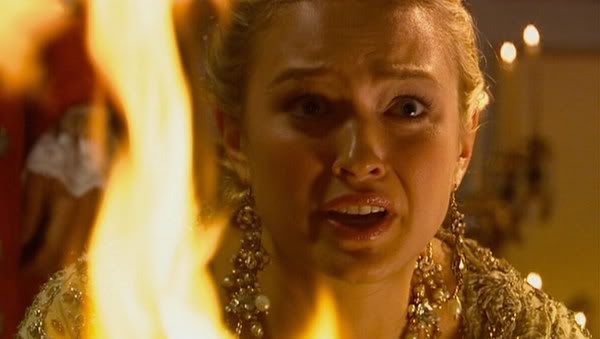 Reinette looks through the fireplace for the Doctor
