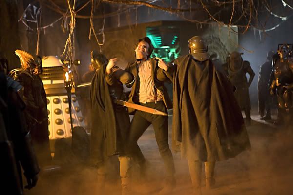The Doctor is dragged to the Pandorica as his enemies watch.