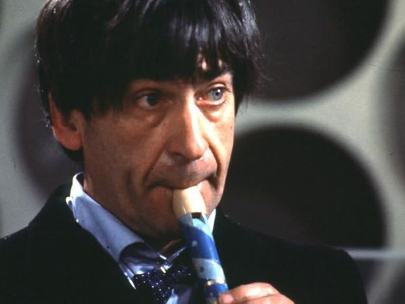 The Second Doctor playing his recorder