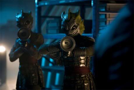 The Silurian warriors assist the Doctor in A Good Man Goes to War