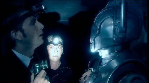 The Doctor and Mrs. Moore inspect Cybermen in the cooling tunnels in The Age of Steel